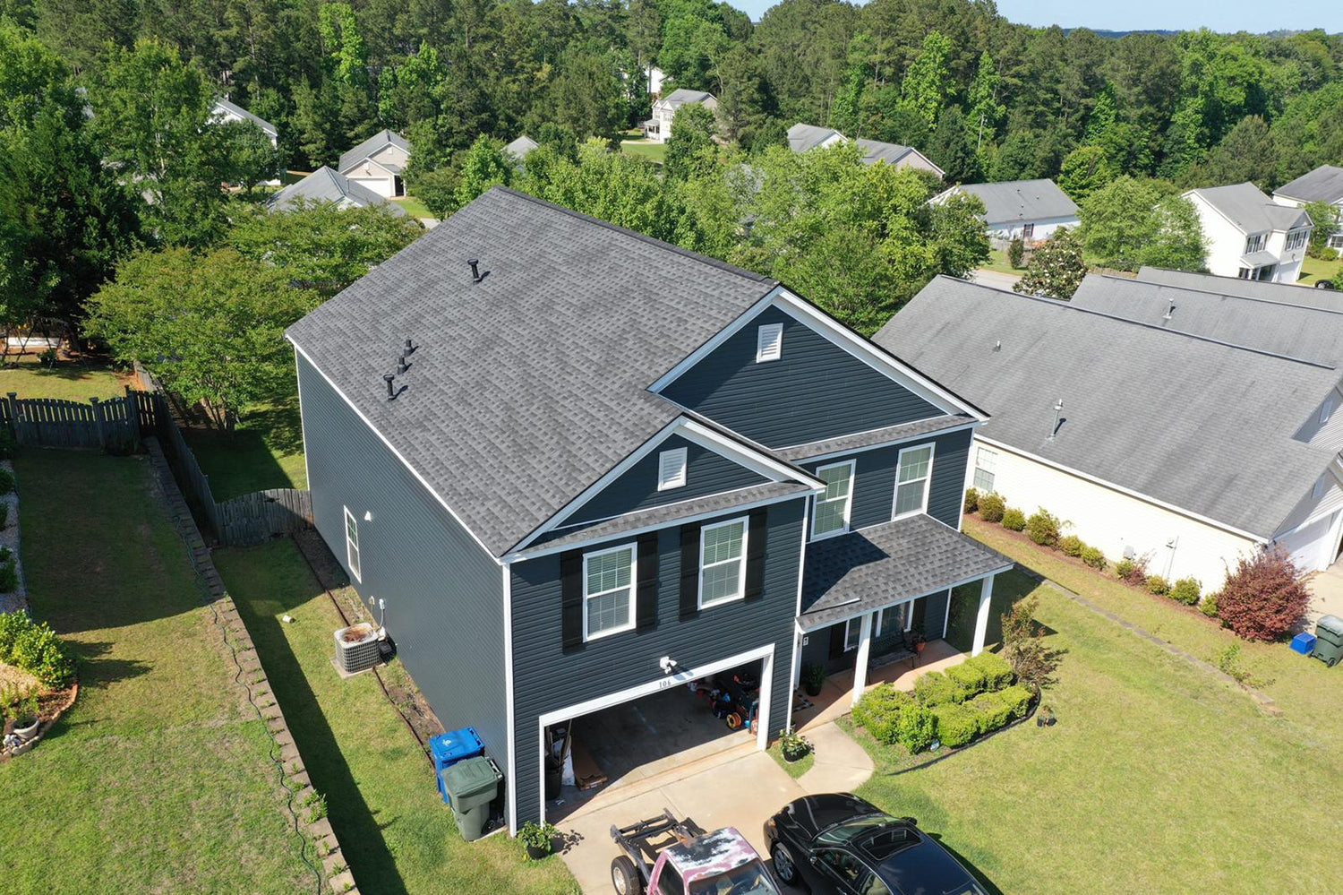 Atlas Roofing and Solar GAF HDZ Charcoal Roof And Brunswick Siding Replacement
